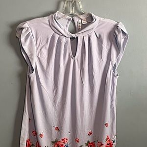 SELLING ELLE TOP FOR WOMEN SIZE XS COLOR LIGHT BLUE CUT OUT WITH FLORAL PATTERN